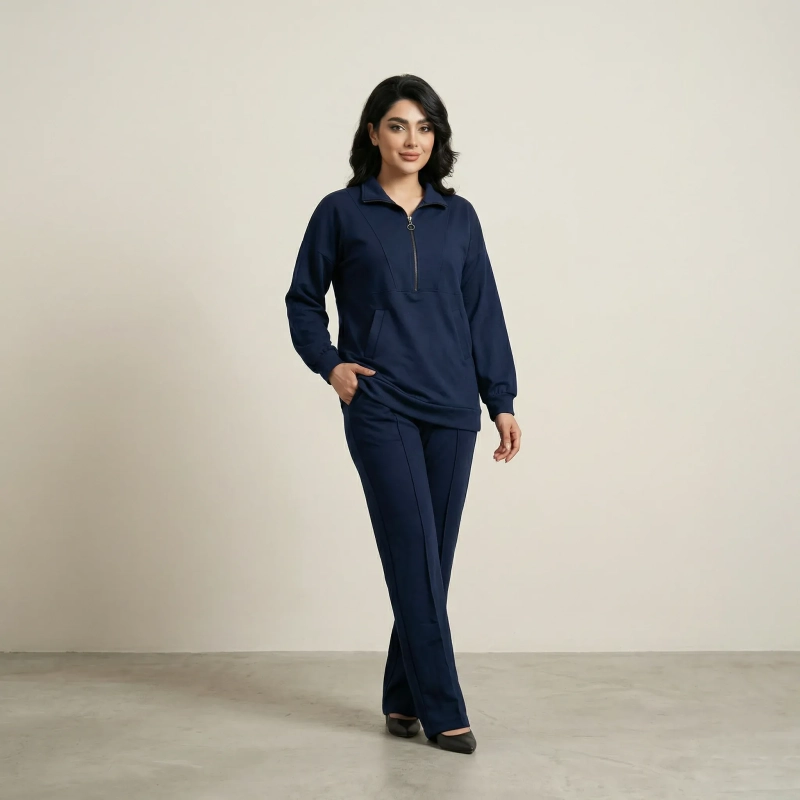 طقم نسائي مريح مكون من تونيك بسحاب ربعي وبنطال واسع الساقين، يوفر راحة فائقة وأناقة محتشمة